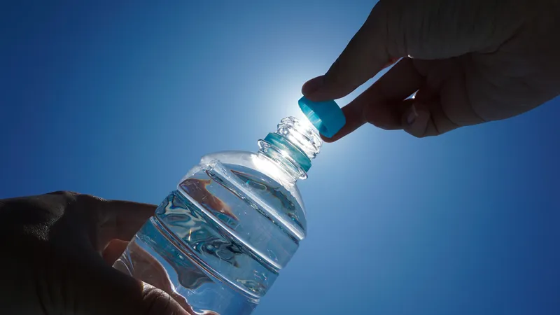 bottle of water, Plastic Fragments, Plastic Fragments in water, nanoplastics,