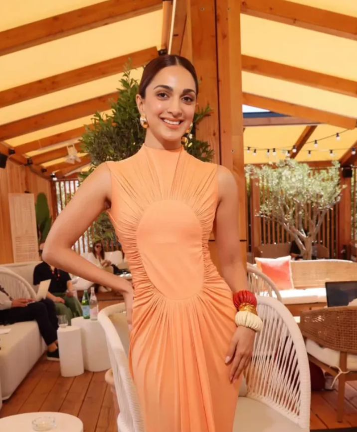 Kiara Advani's donned white and orange hues at the Cannes 2024